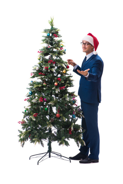 Επιχειρηματίας διακόσμηση χριστουγεννιάτικο δέντρο απομονώνονται σε λευκό - Φωτογραφία, εικόνα