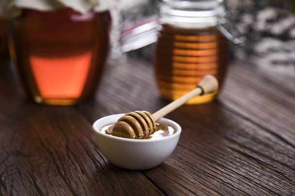 Fresh honey on wooden table - Photo, Image