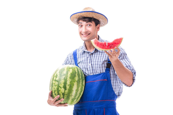 Young farmer with watermelon isolated on white - Фото, изображение