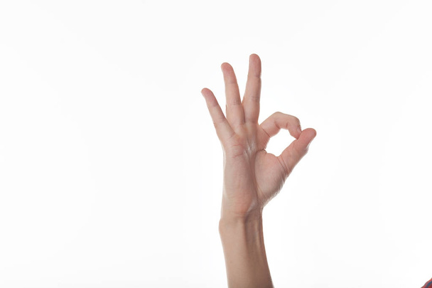 Human hand gesture is all right everything is OK. Isolated. - Photo, image