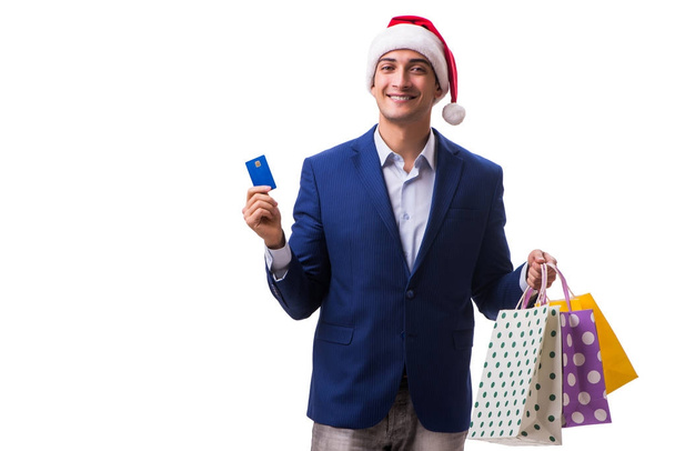 Young man with bags after christmas shopping on white background - Foto, Imagem