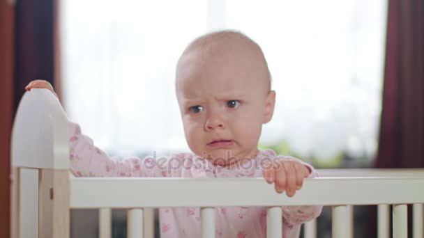 Baby Standing in a Crib at Home - Felvétel, videó