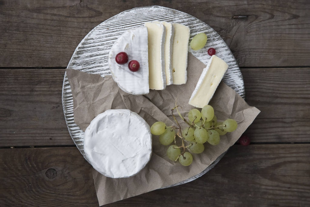 camembert cheese, grape  and cranberry  - Photo, Image