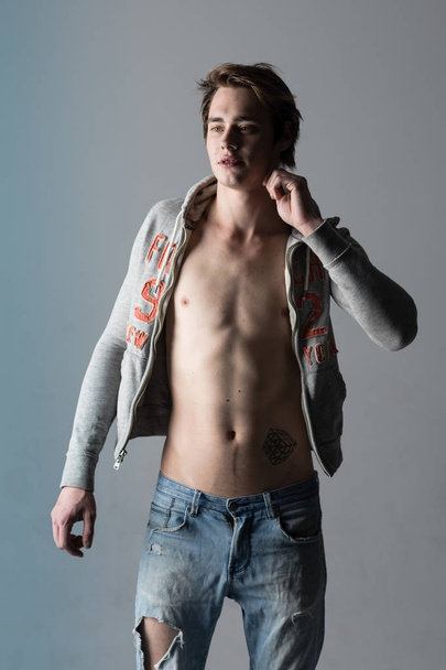 Male model commercial ad shoot at the studio - Zdjęcie, obraz
