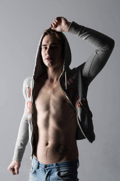 Male model commercial ad shoot at the studio - Фото, изображение