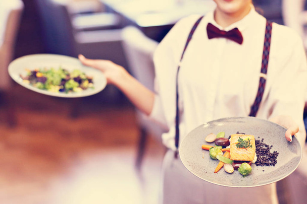 Waiters standing in restaurant - Zdjęcie, obraz