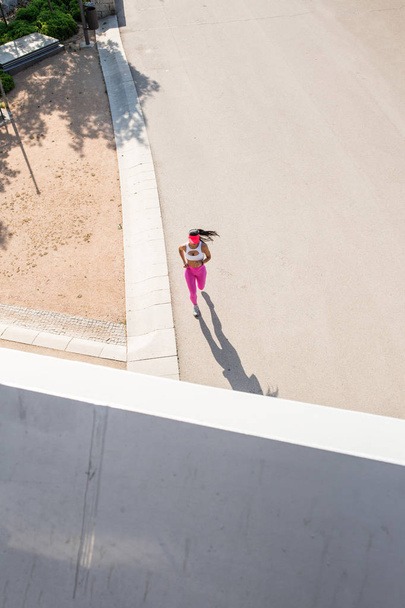 top view of a fit woman runner - Fotografie, Obrázek