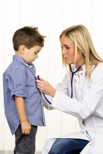 doctor and little boy - Фото, изображение
