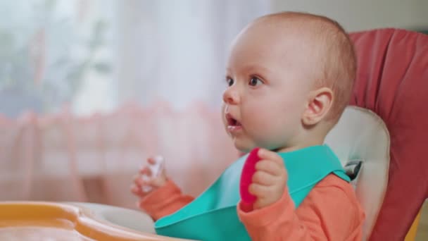 A Baby Girl Eating Puree at Home - Záběry, video
