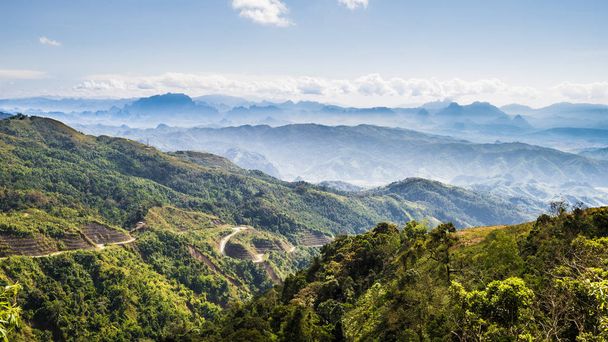 view on rhe top of Mountain and blue sky at Kasi, Laos - Photo, Image