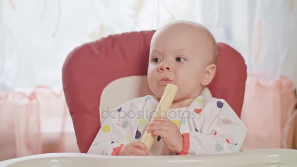 A Baby Girl Eating Waffle and Playing at Home - Imágenes, Vídeo