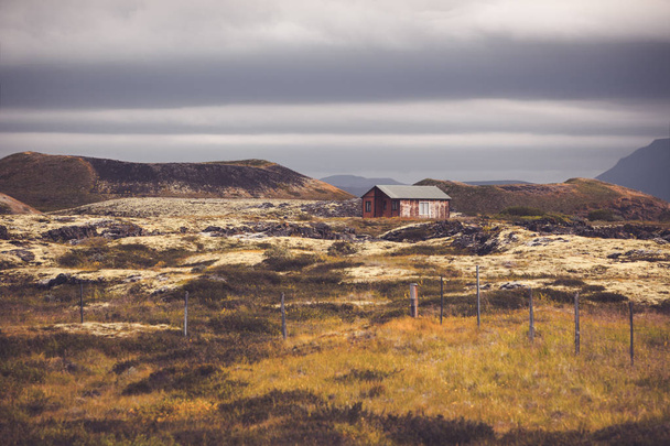 Small wooden cottage in Iceland landscape - 写真・画像