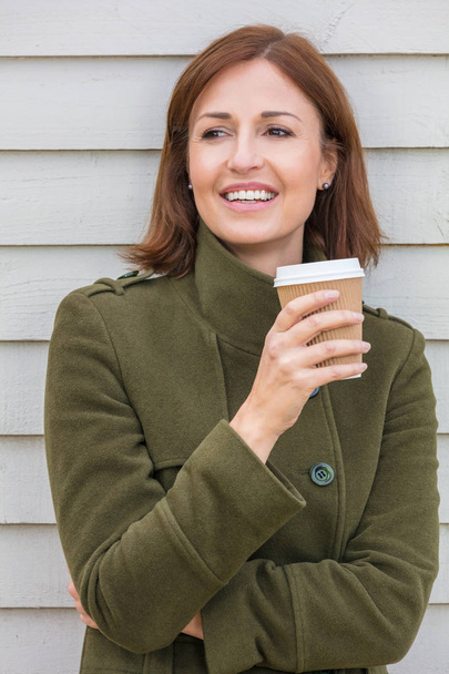 Happy Attractive Middle Aged Woman Smiling Drinking Coffee - Valokuva, kuva