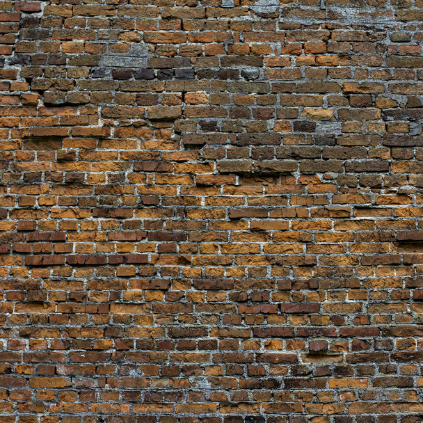 zeer oude bakstenen muur - Foto, afbeelding