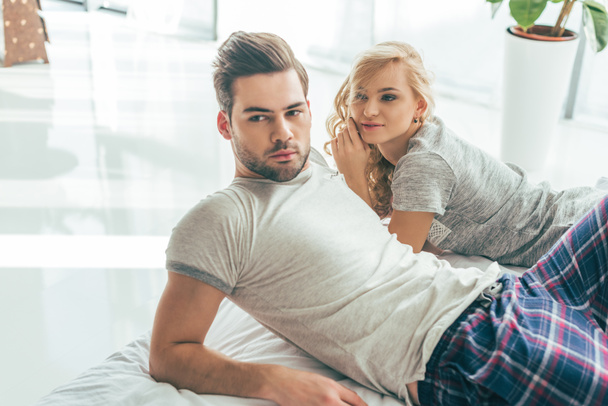 young couple in bedroom - Photo, Image