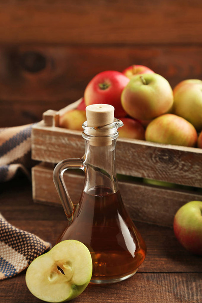Apple vinegar in glass bottle - Fotoğraf, Görsel