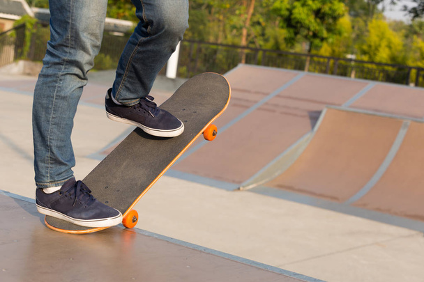 skateboarder practicing on ramp   - 写真・画像