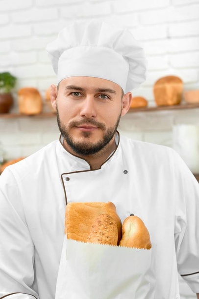Professional baker at his store - Zdjęcie, obraz