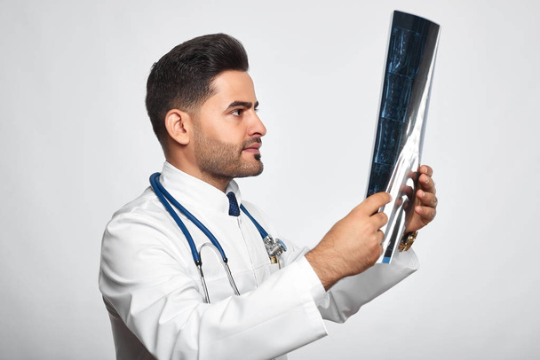 Male doctor posing at studio - Фото, изображение