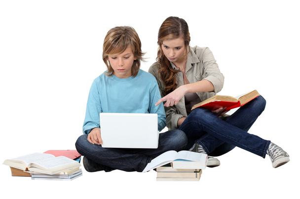 Two kids revising together - Φωτογραφία, εικόνα