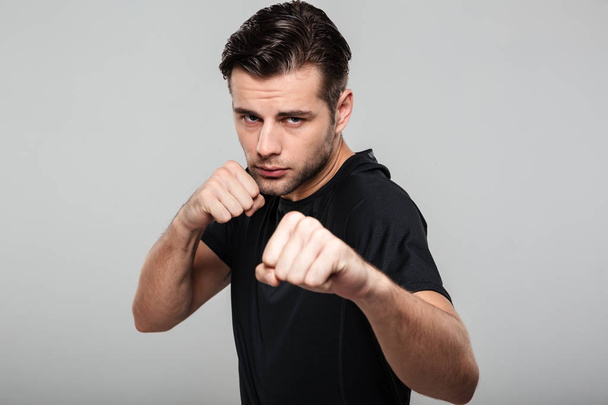 Close up portrait of a strong fit sportsman - Photo, image