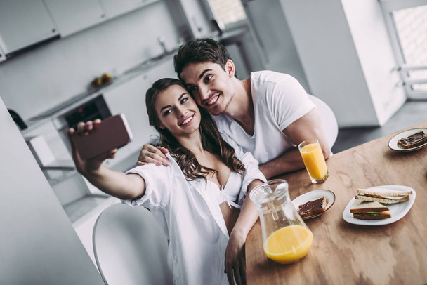 Couple on kitchen - Photo, Image