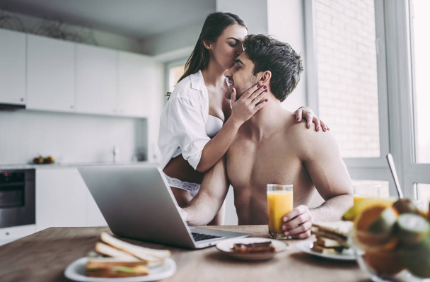 Couple on kitchen - 写真・画像