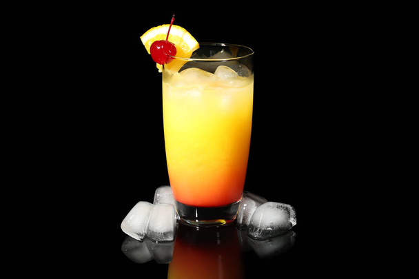 Glass with tasty exotic cocktail - 写真・画像