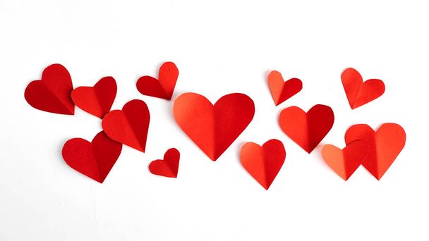 Red paper hearts isolated on white background - Foto, afbeelding