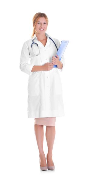 Doctor with clipboard on white background - Φωτογραφία, εικόνα
