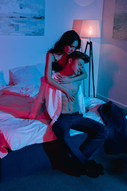 woman undressing her boyfriend - Photo, Image