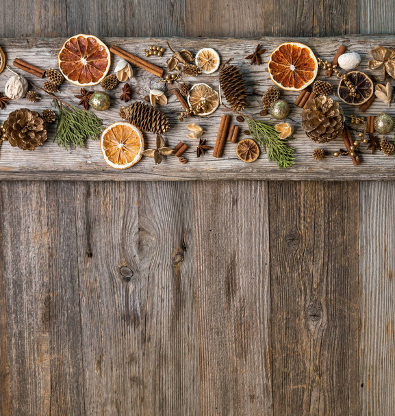 Christmas decorations with cinnamon and dried orange slices - Photo, Image