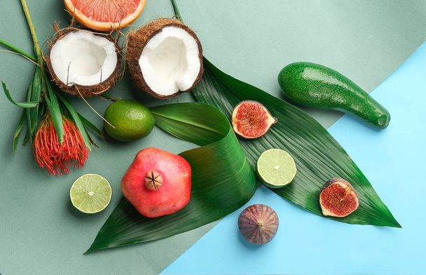 Tropical leaves and exotic fruits - Fotoğraf, Görsel