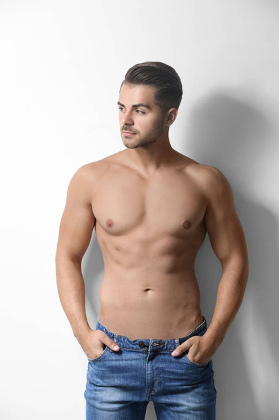 Sexy shirtless man on white background - Zdjęcie, obraz