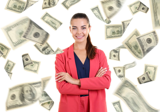 Young woman with money on white background - Photo, image