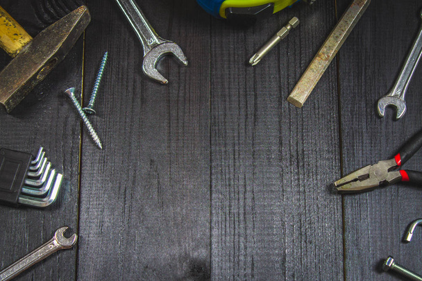 Joinery tools on a dark wooden table. Place for the text. A concept for Father's Day. - Foto, Bild