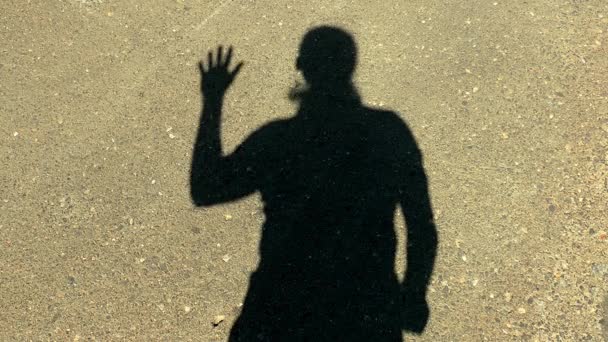 Uomo ombra sulla parete Espressioni
 - Filmati, video