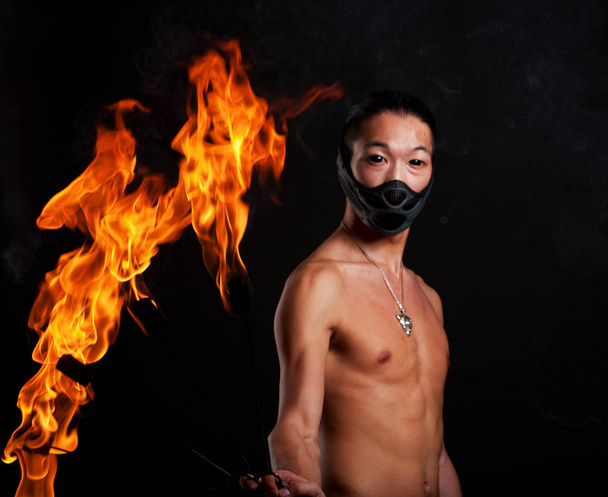 asian man with fire show - Fotó, kép