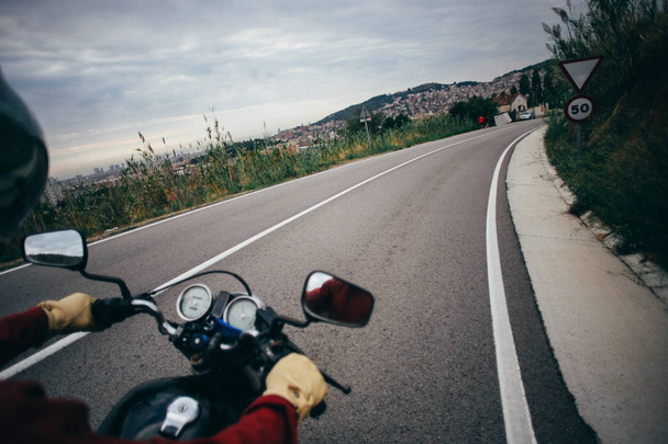 Motorradfahrerarm  - Foto, Bild