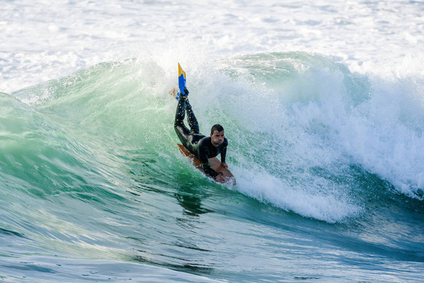 Bodyboarder surfen ocean wave - Foto, afbeelding