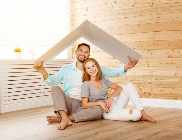 concept housing a young family. couple in  new hom - Photo, Image