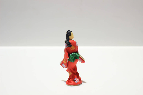 modelo de la figura de estilo japonés en el tablero - Foto, imagen