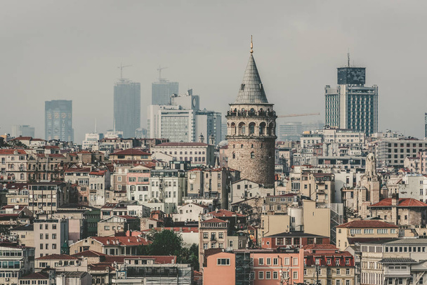 Вид на Галатский мост и район с двора мечети Сулеймание через купола медресе, Стамбул, Турция
 - Фото, изображение