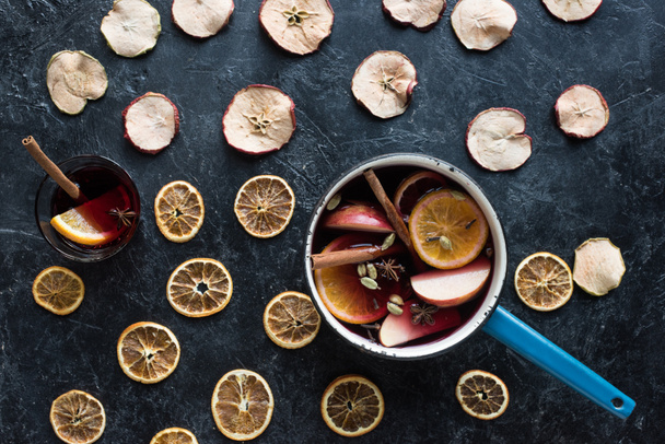 water dipper and glass with mulled wine - Photo, Image