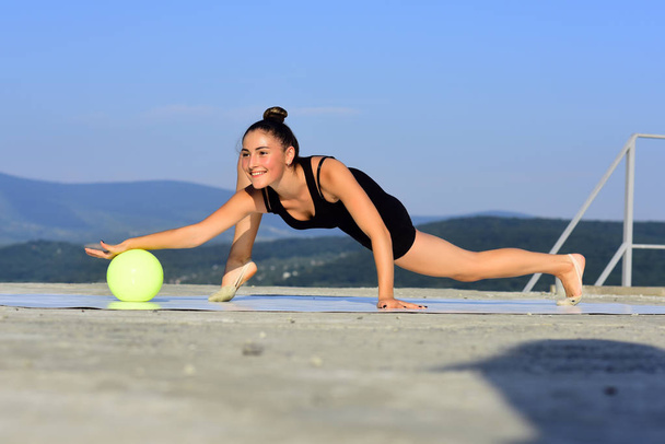 Flexibility in acrobatics and fitness health. - Фото, изображение