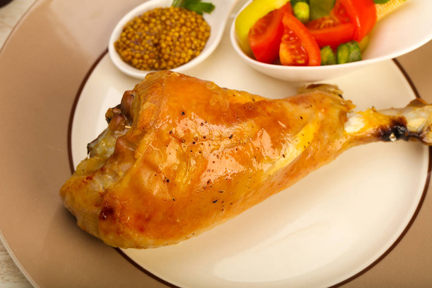 Roast turkey leg with salad on wooden table background - Photo, Image