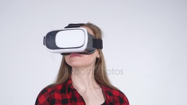 Girl with VR Set Turning Head - Filmati, video