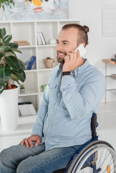 disabled man talking by phone - Fotó, kép