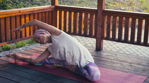 Attractive woman doing yoga exercises - Zdjęcie, obraz