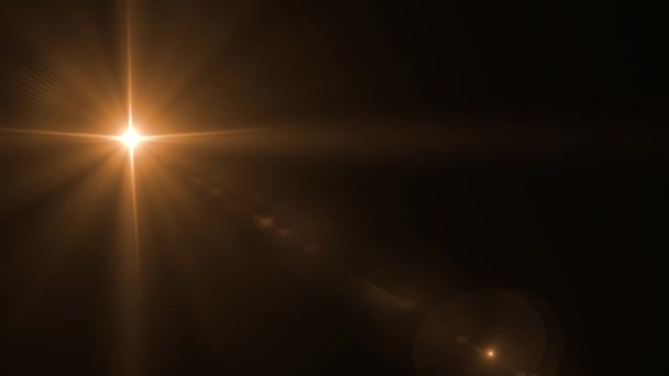 Abstract lens flare light over black background - Footage, Video